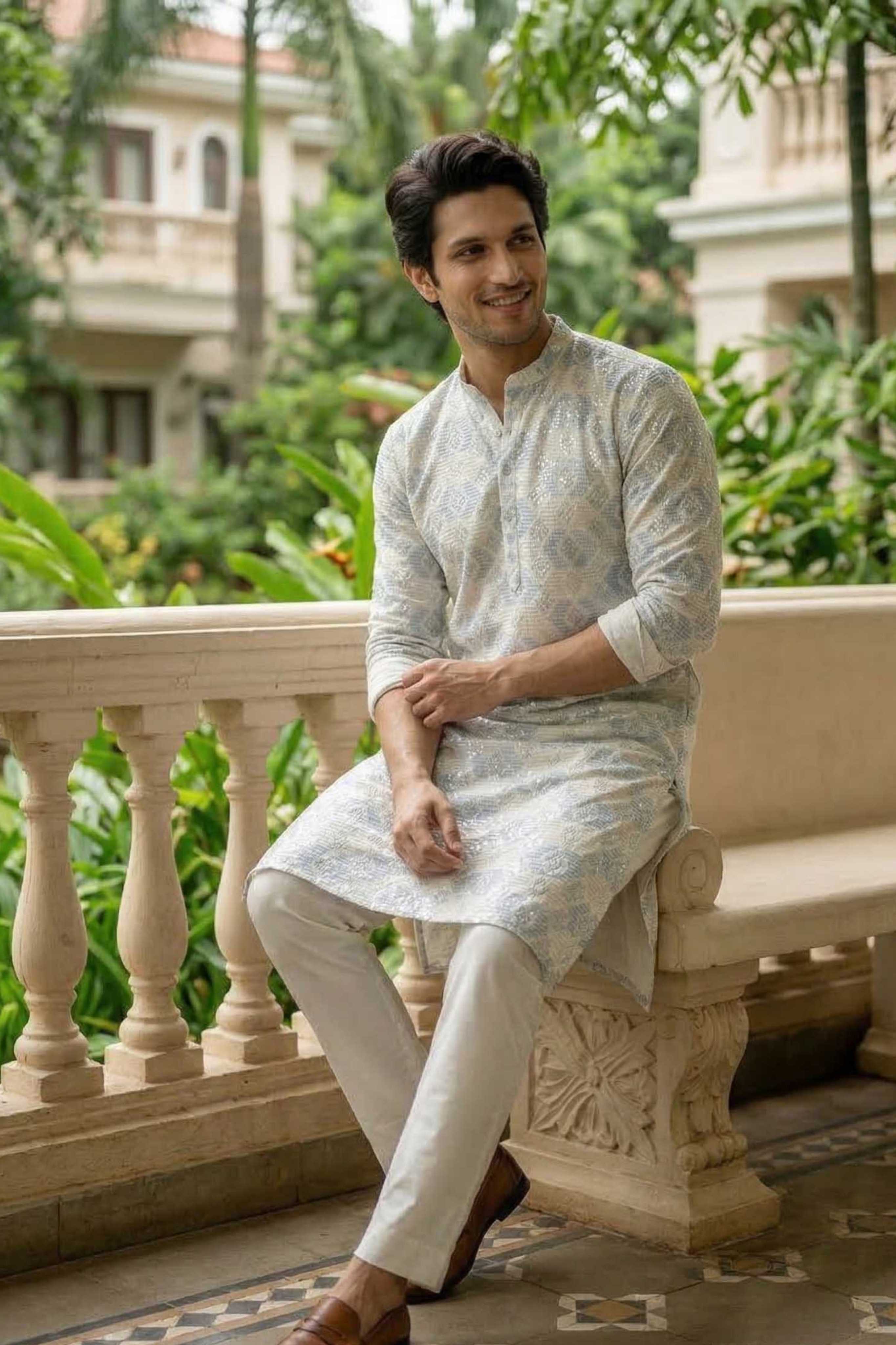 The Off White Long Kurta With Blue and Pearl Thread and Sequins Work