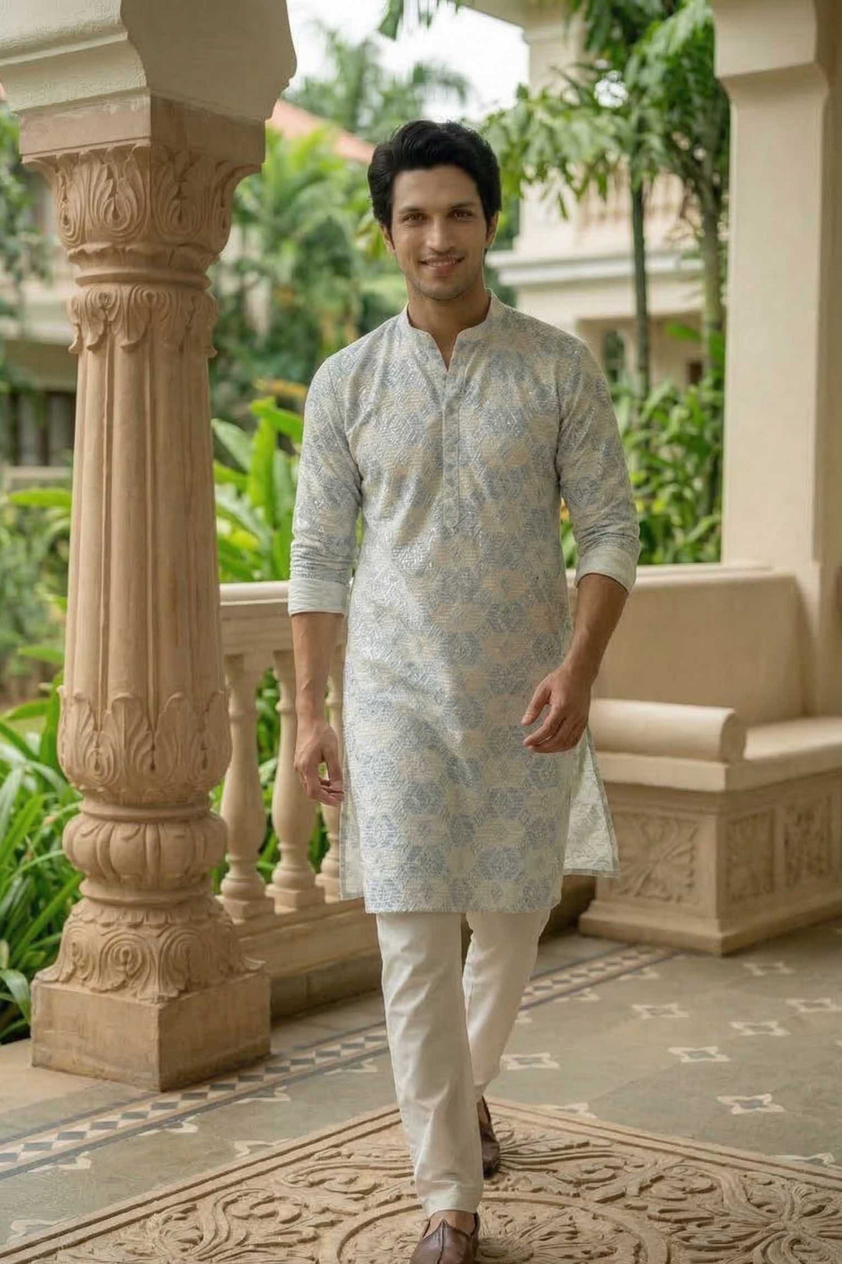 The Off White Long Kurta With Blue and Pearl Thread and Sequins Work
