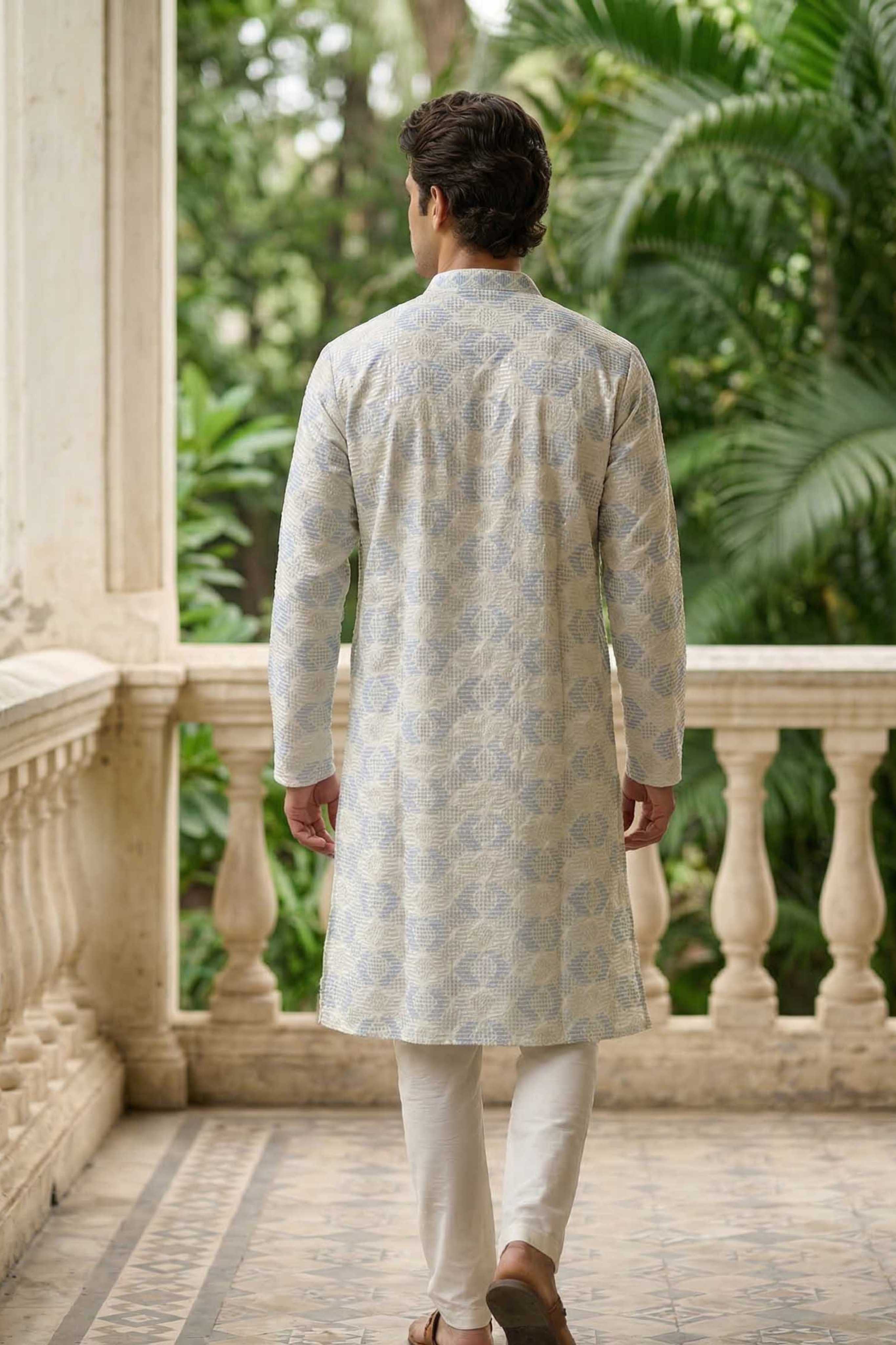 The Off White Long Kurta With Blue and Pearl Thread and Sequins Work