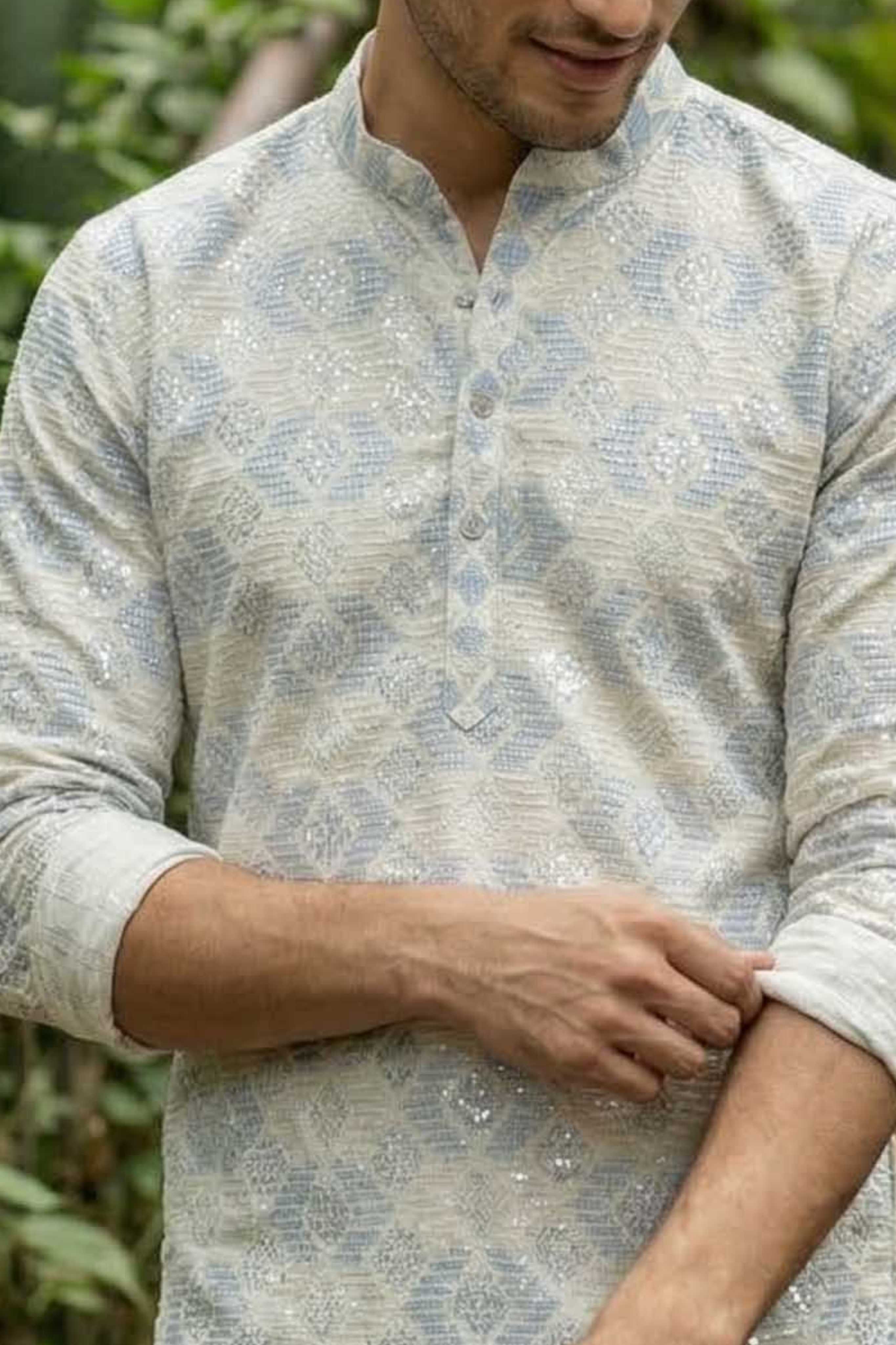 The Off White Long Kurta With Blue and Pearl Thread and Sequins Work