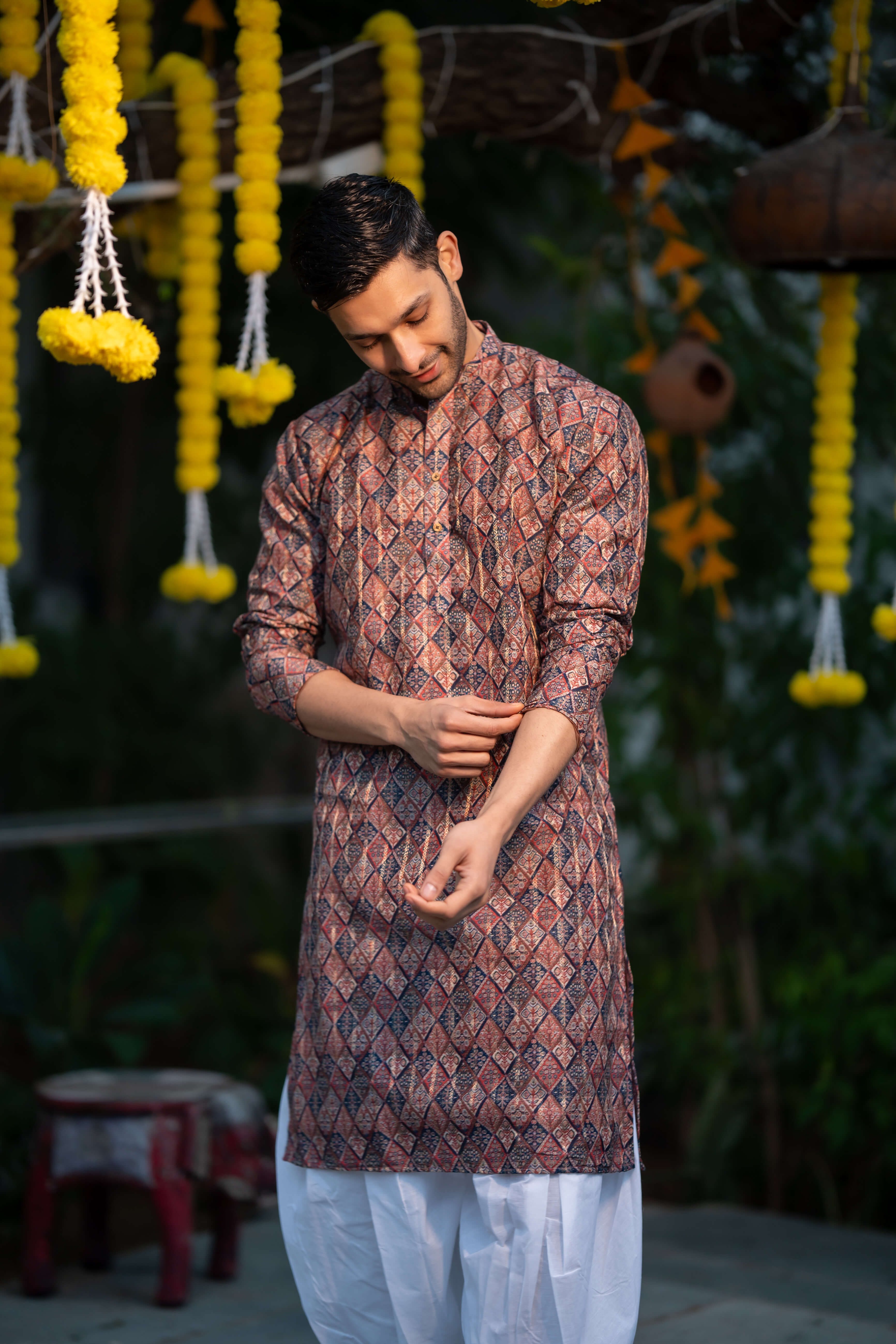 The Muliticolor Long Kurta with Golden Zari Stripe and Tribal Geometric Print