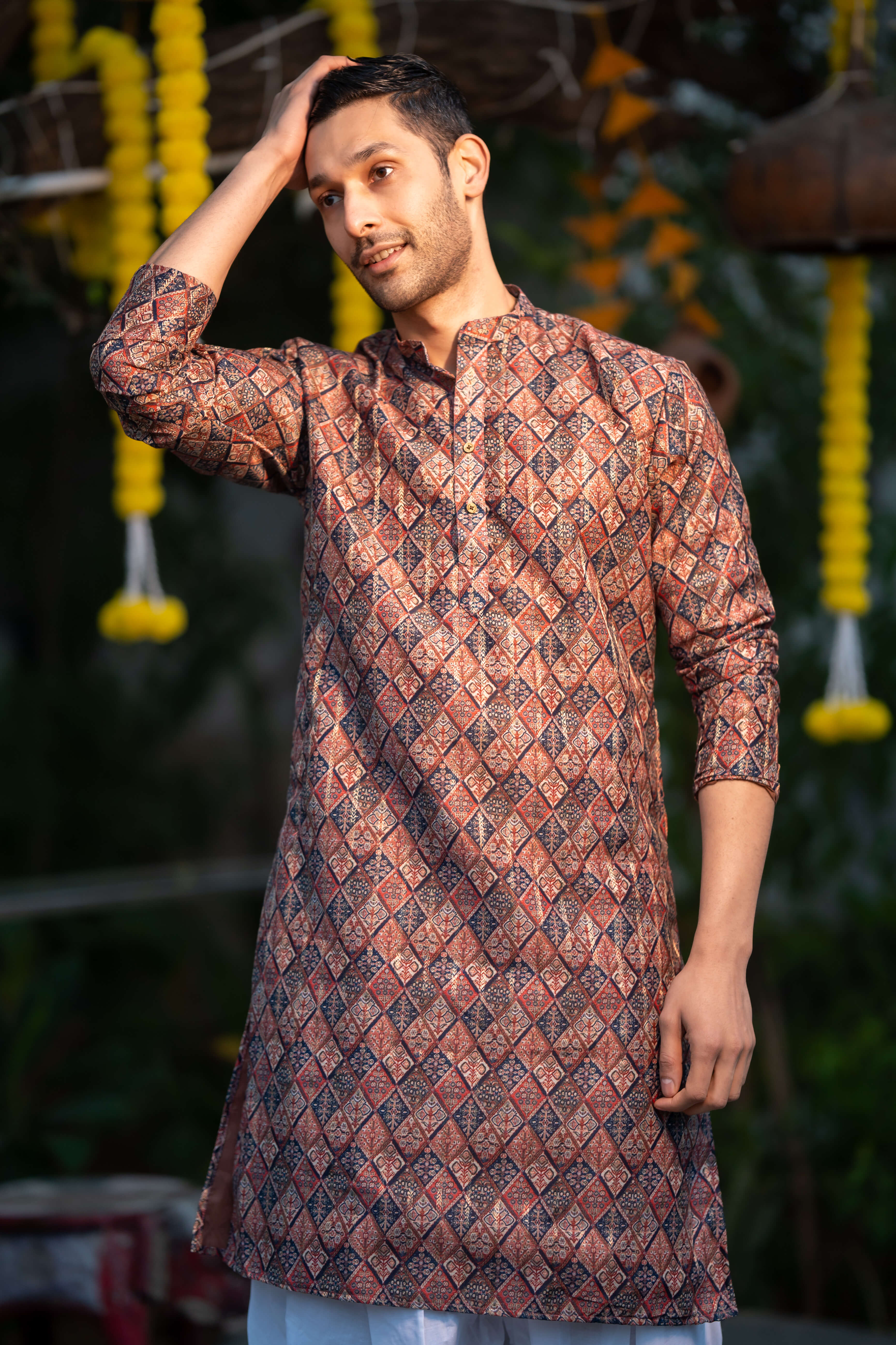 The Muliticolor Long Kurta with Golden Zari Stripe and Tribal Geometric Print