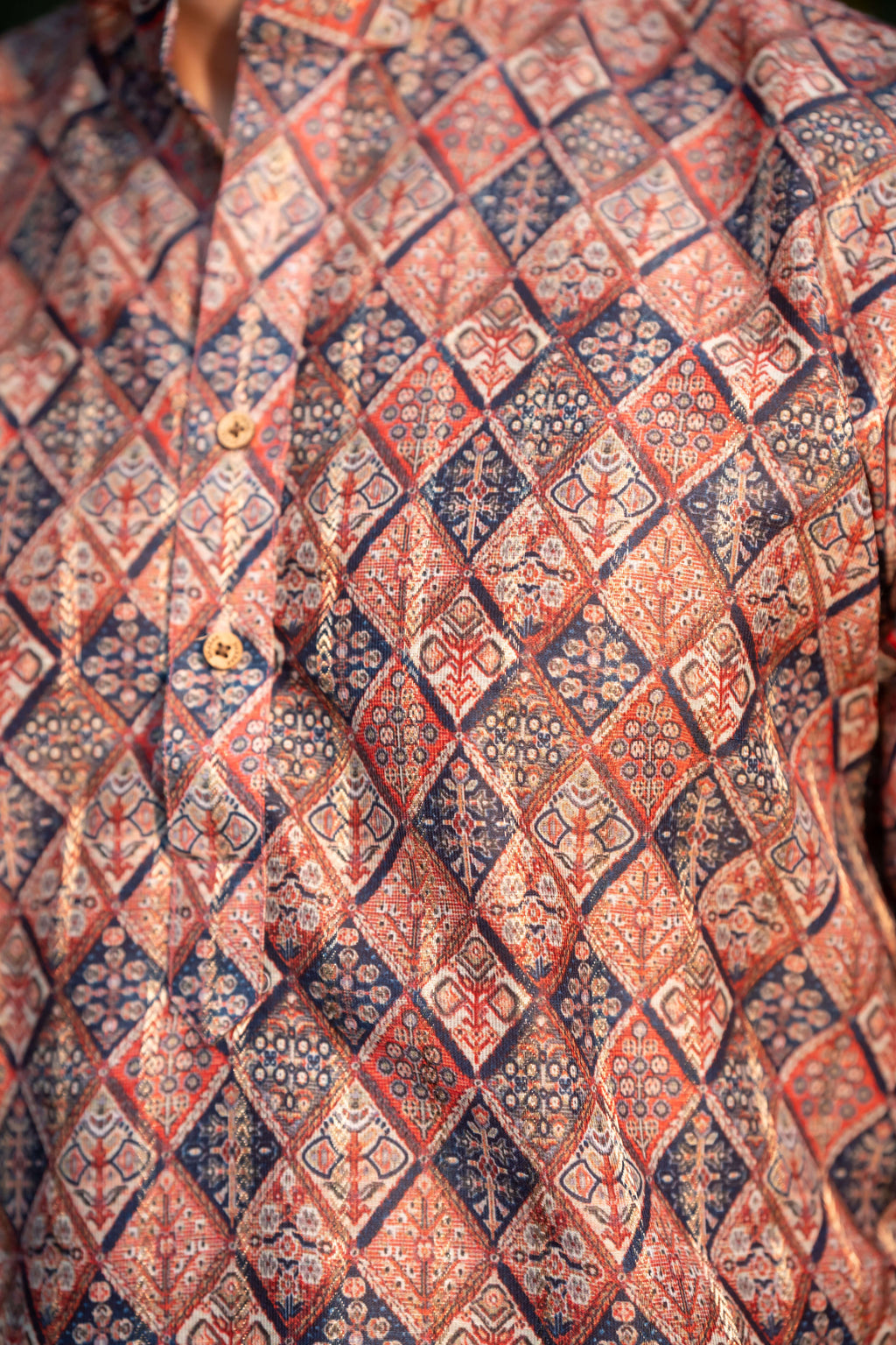 The Muliticolor Long Kurta with Golden Zari Stripe and Tribal Geometric Print