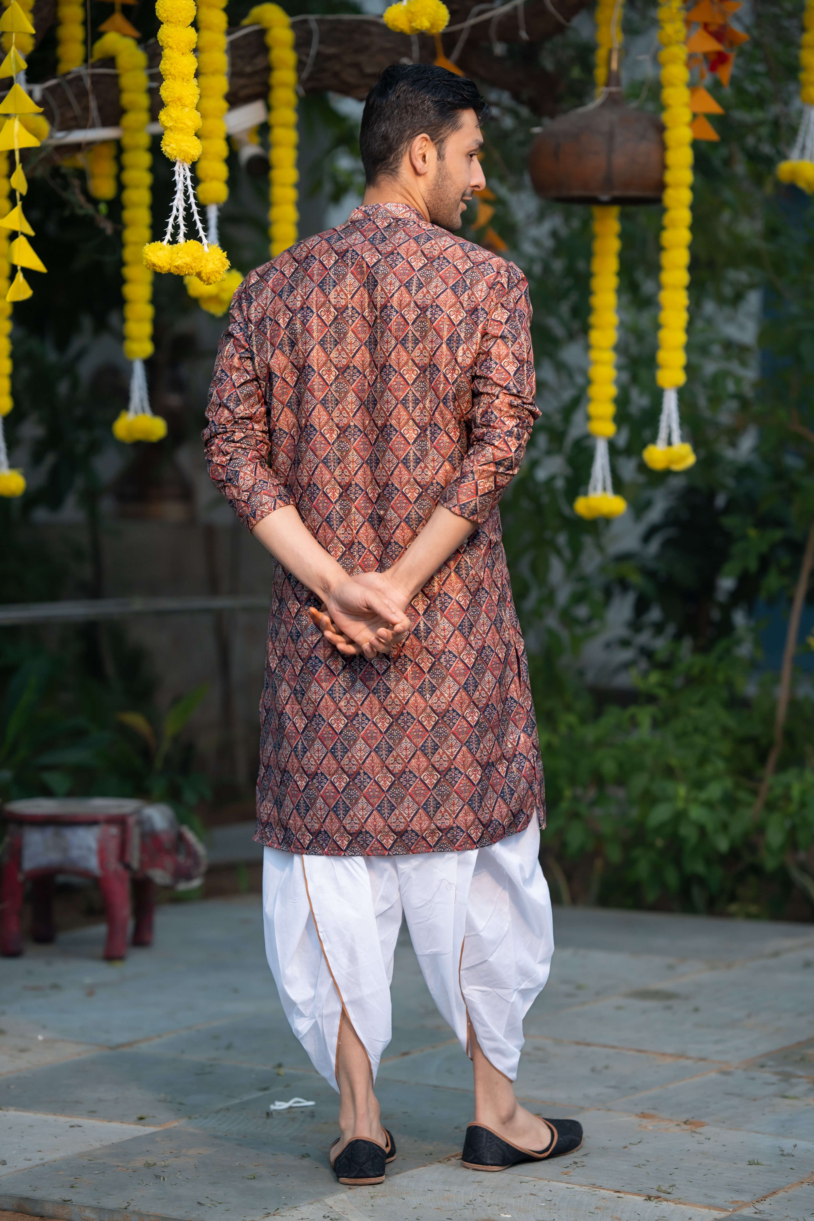 The Muliticolor Long Kurta with Golden Zari Stripe and Tribal Geometric Print