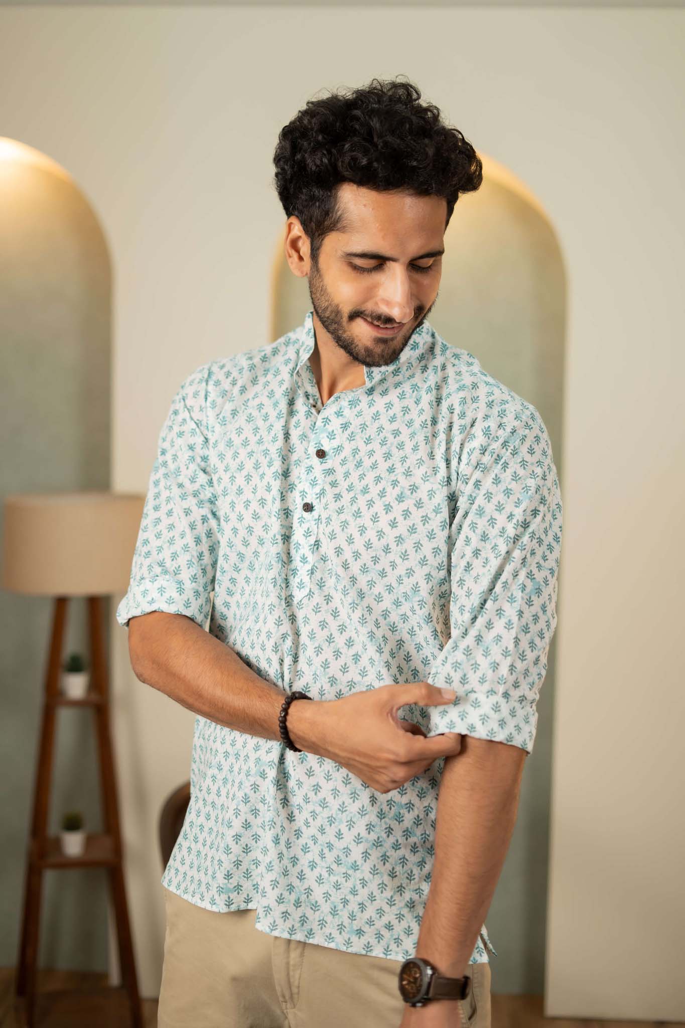 The White Short Kurta With Green Color Flower Butti Print