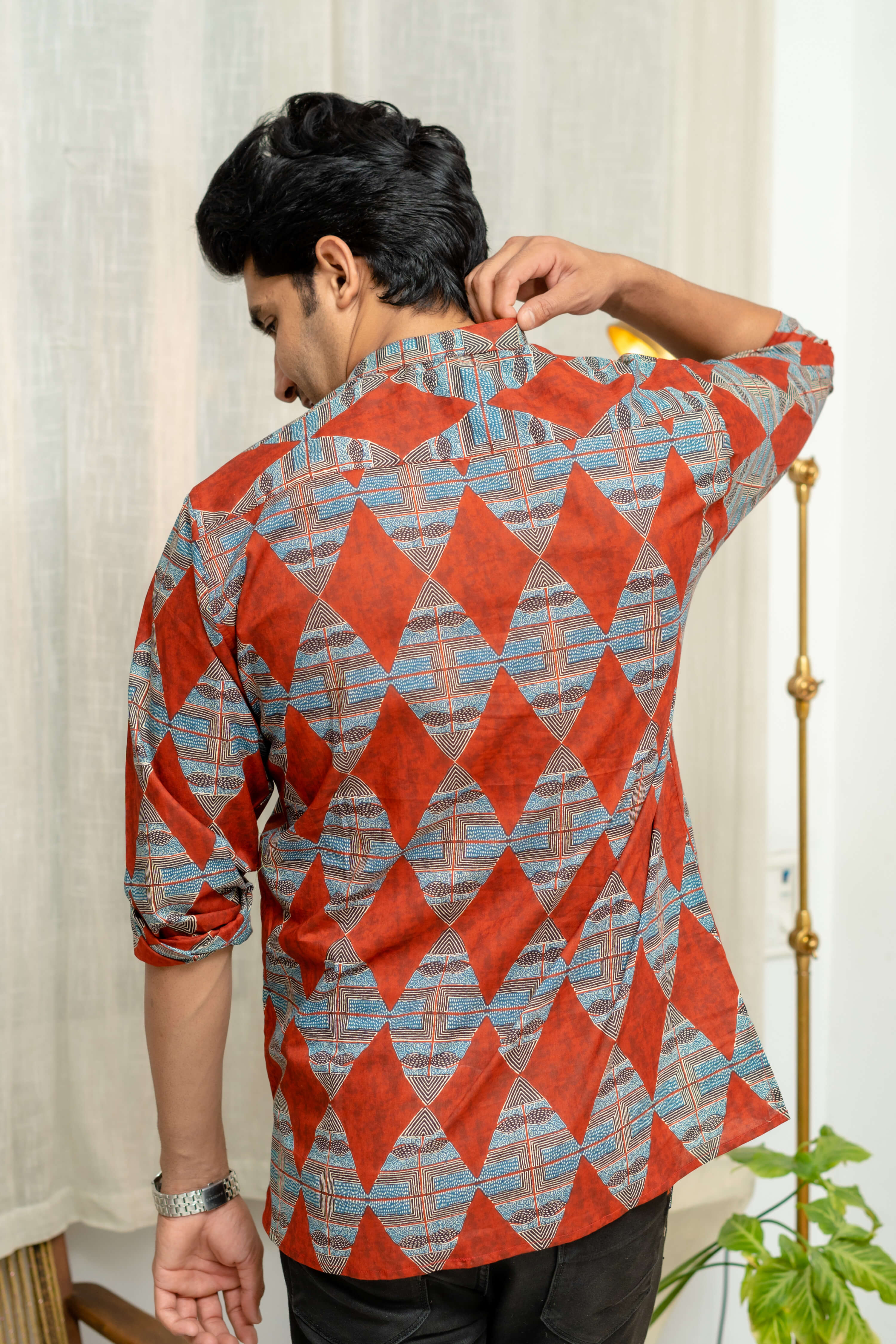 The Diamond Shaped Tribal Print Short Kurta In Brick Color