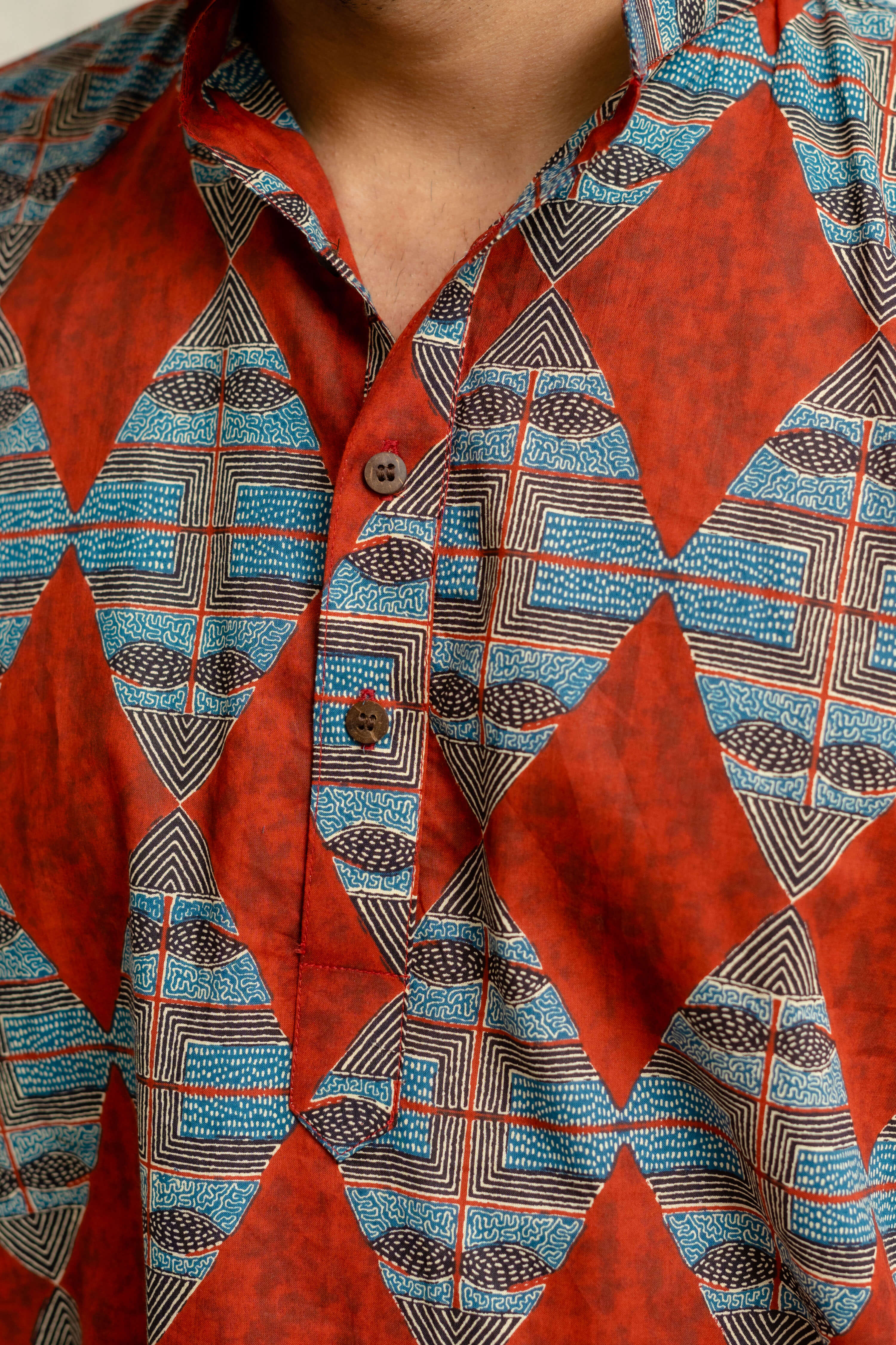 The Diamond Shaped Tribal Print Short Kurta In Brick Color