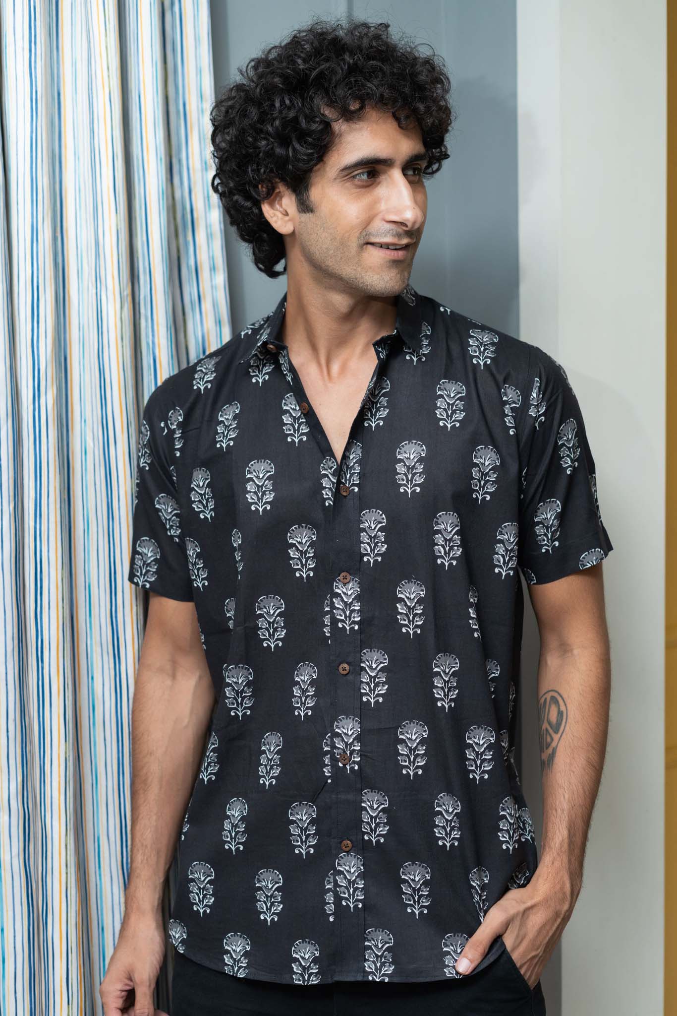 The Black Half Sleeves Shirt With White Flower Print