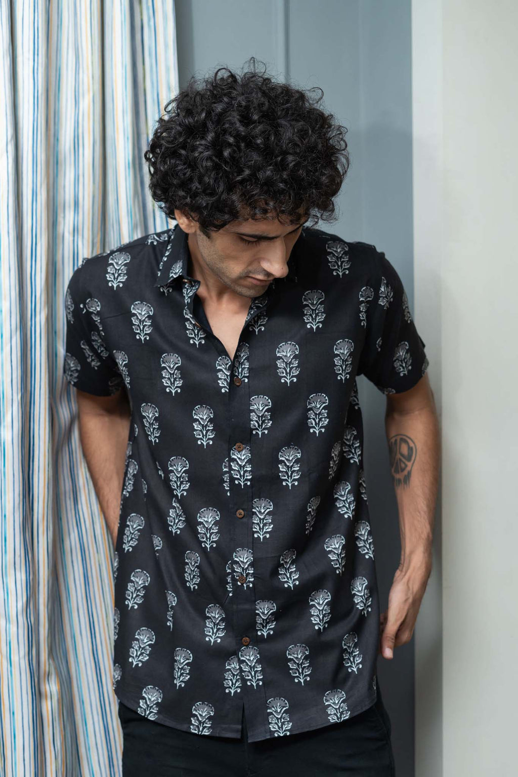 The Black Half Sleeves Shirt With White Flower Print