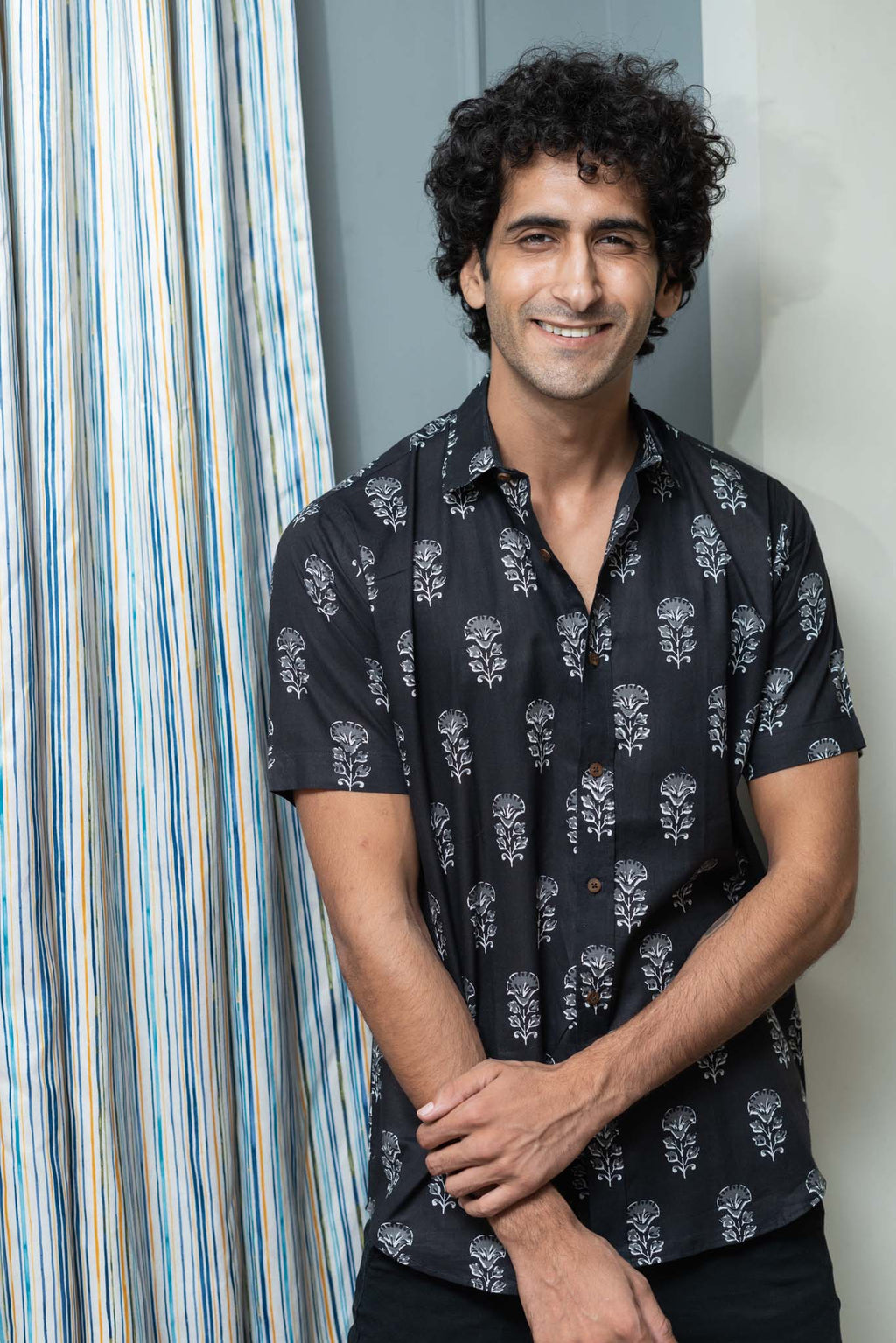 The Black Half Sleeves Shirt With White Flower Print