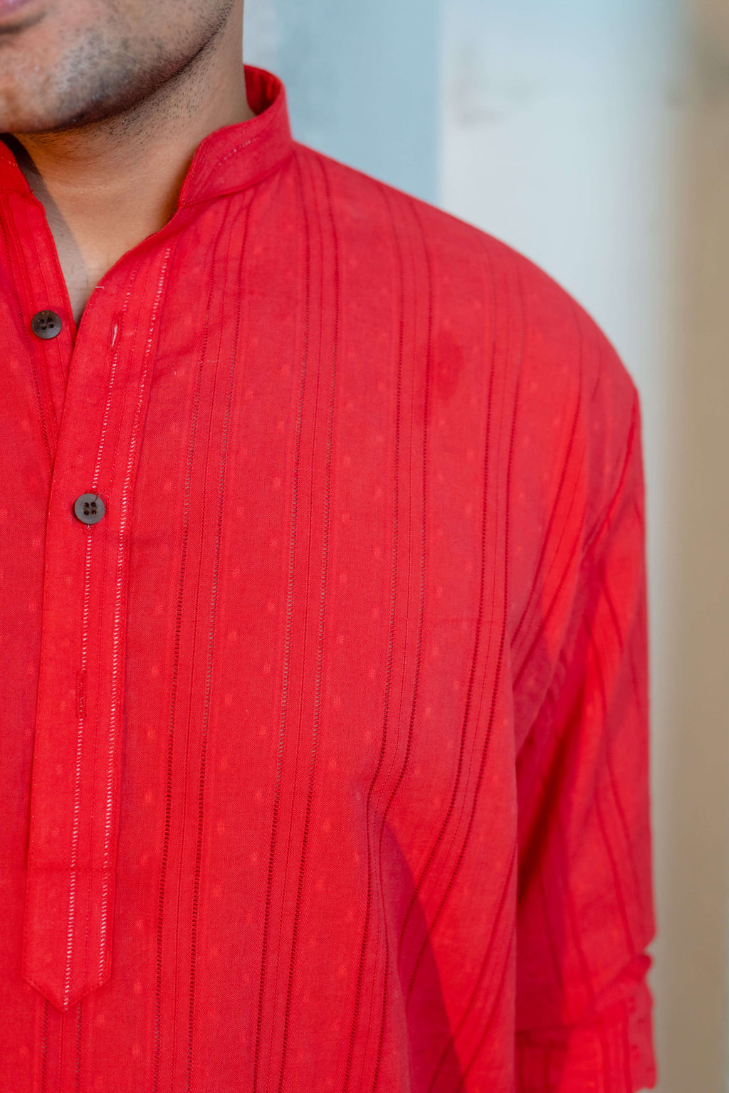 Close up look of men's red color long kurta