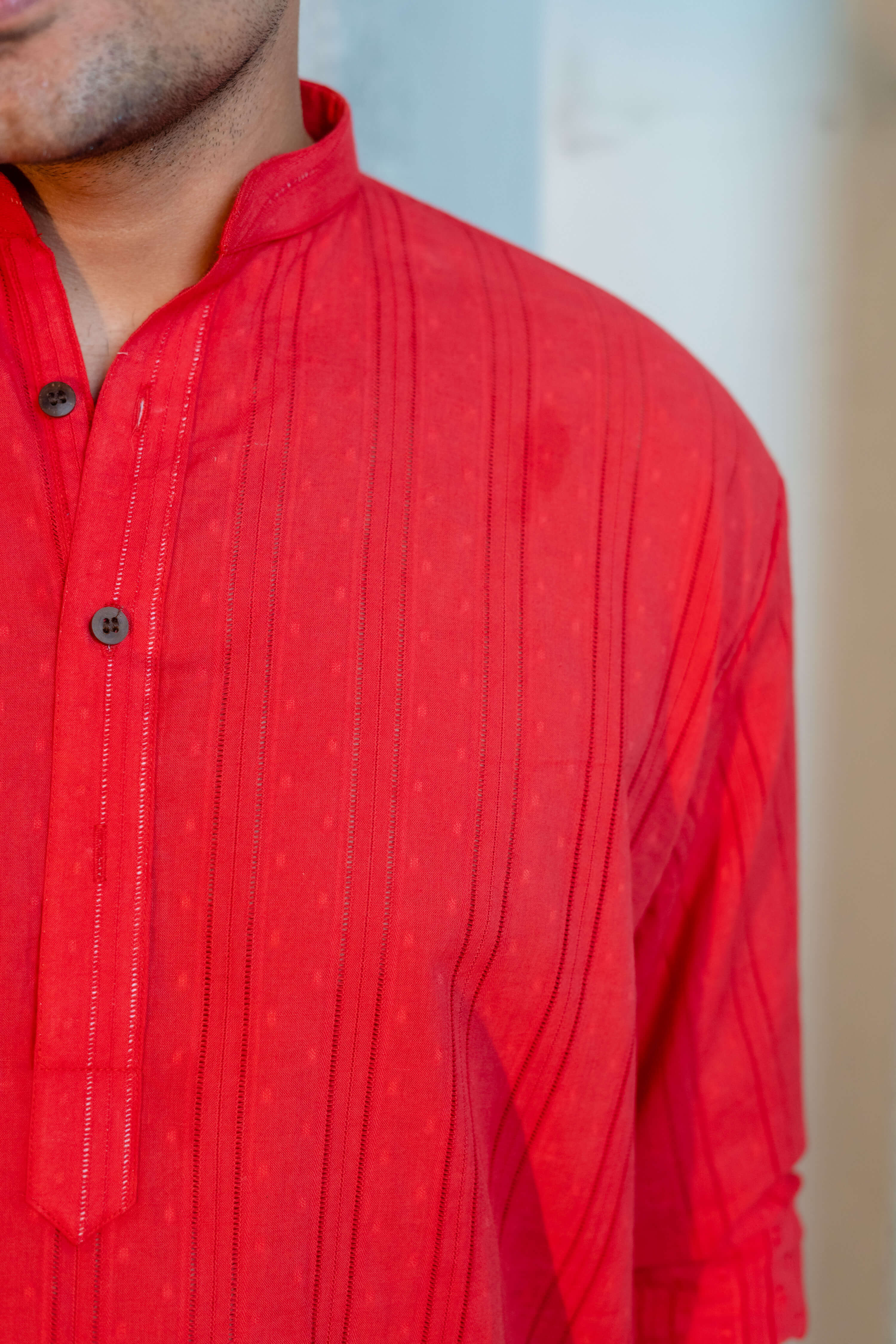 Close up look of men's red color long kurta