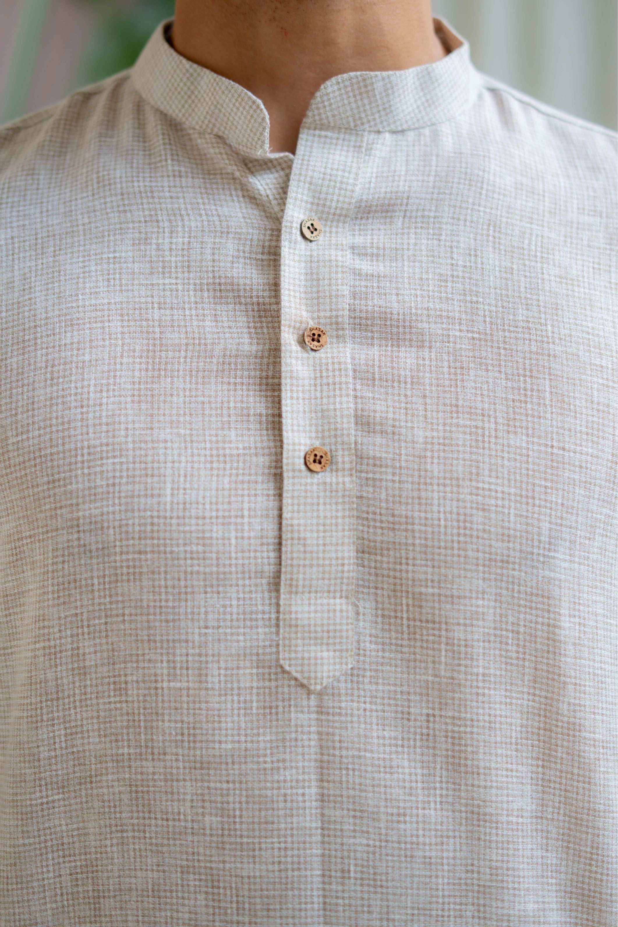The Off White Yarn Dyed Short Kurta with Beige Weave Design