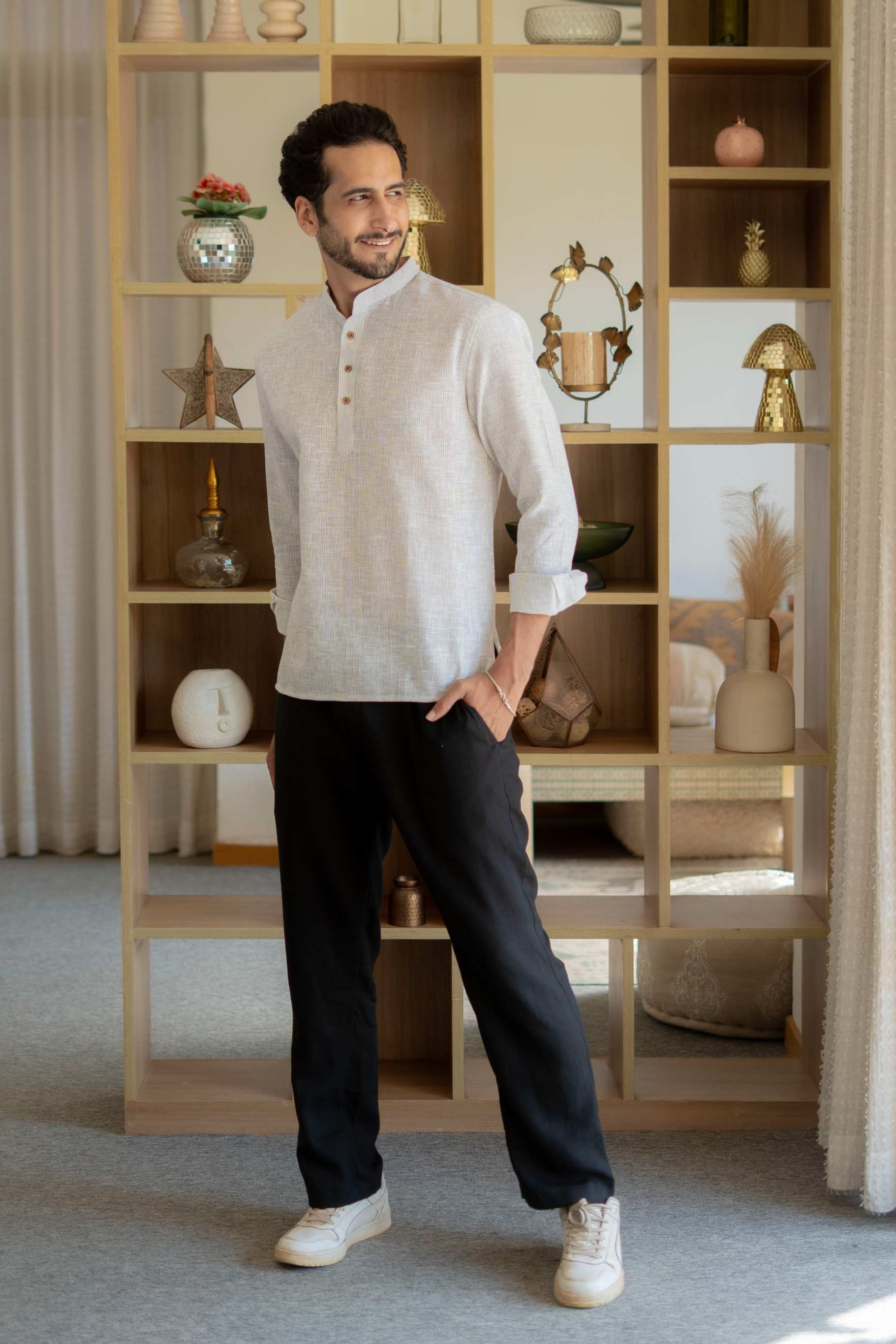 The Off White Yarn Dyed Short Kurta with Blue Weave Design