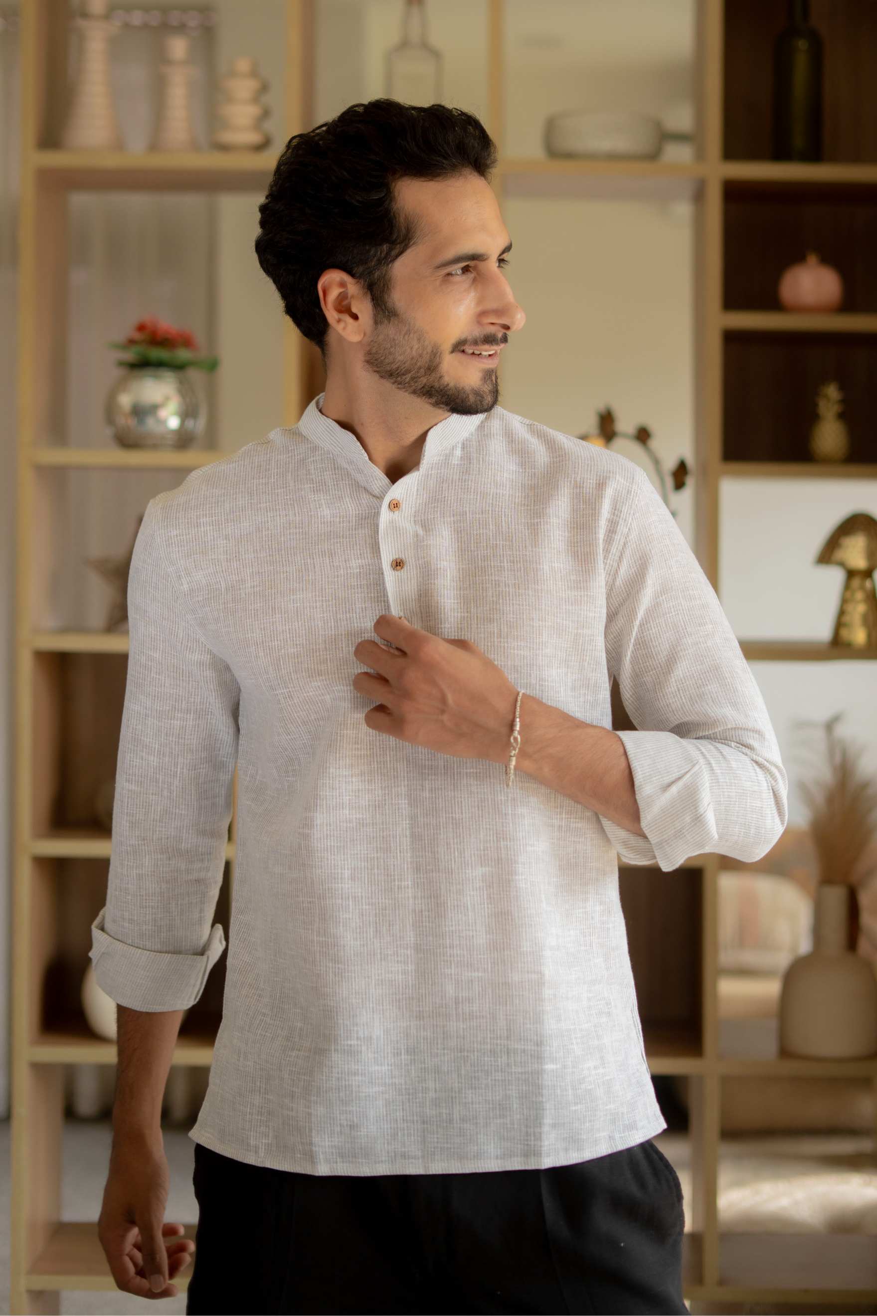 The Off White Yard Dyed Short Kurta with Olive Weave Design
