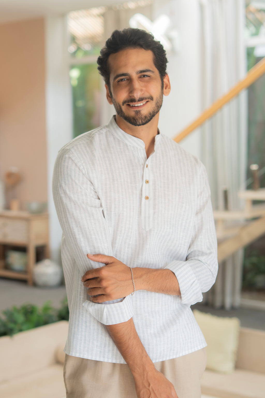 The Off White Yarn Dyed Short Kurta with Blue Stripes